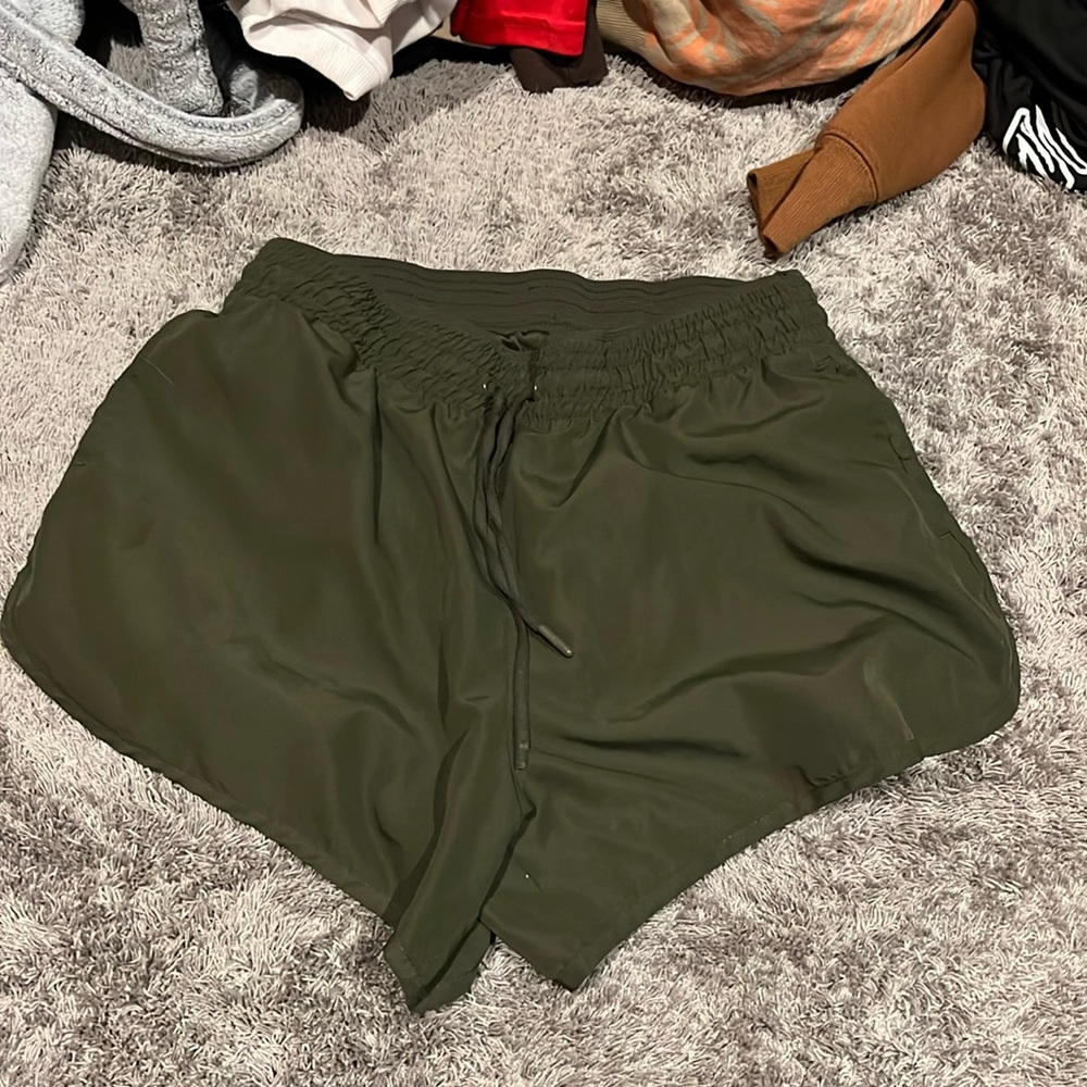 Green athletic shorts